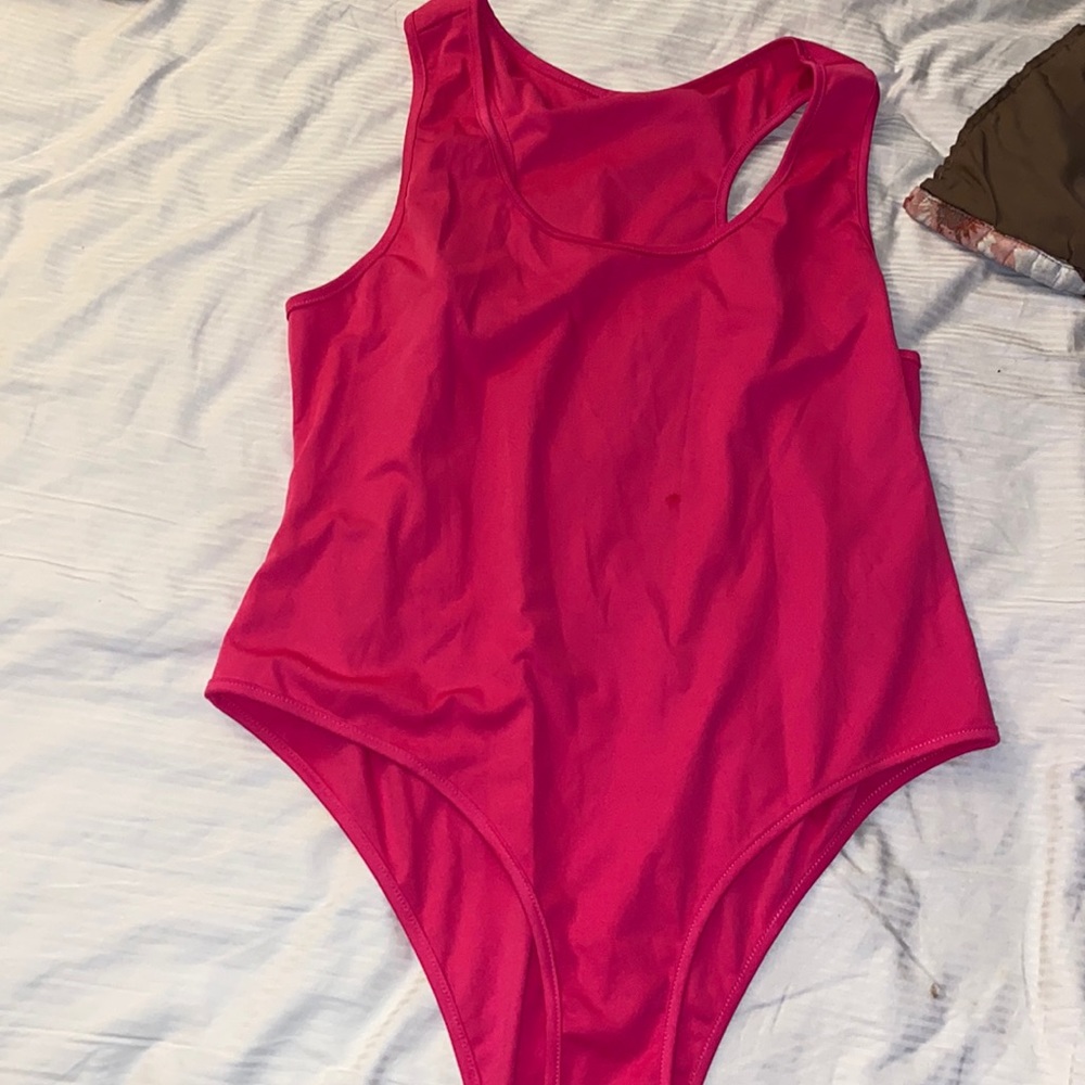 Slightly worn for a half of day on vacation hot pink body suit/swimsuit